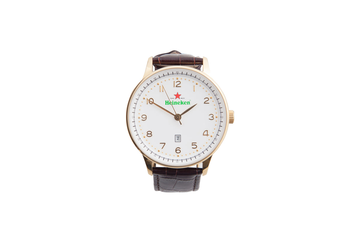 Elegant gold-colored wristwatch with Heineken logo and leather strap.