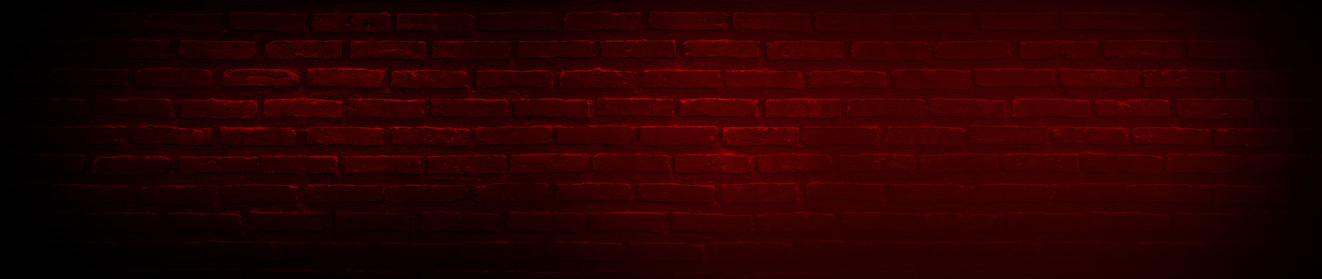 Dark red brick wall with a textured pattern