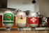 Three 8L Beer Kegs including Heineken, Birra Moretti, and Cruzcampo on a kitchen counter.