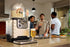 Birra Moretti Blade beer dispenser in kitchen – friends enjoying fresh draught beer at home gathering