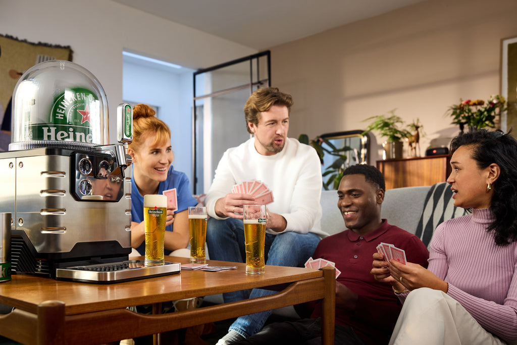 Casual gathering with Heineken beers served fresh from the Heineken Blade home draft system.
