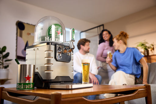 People enjoying Heineken beer freshly served from the Blade Beer Tap.
