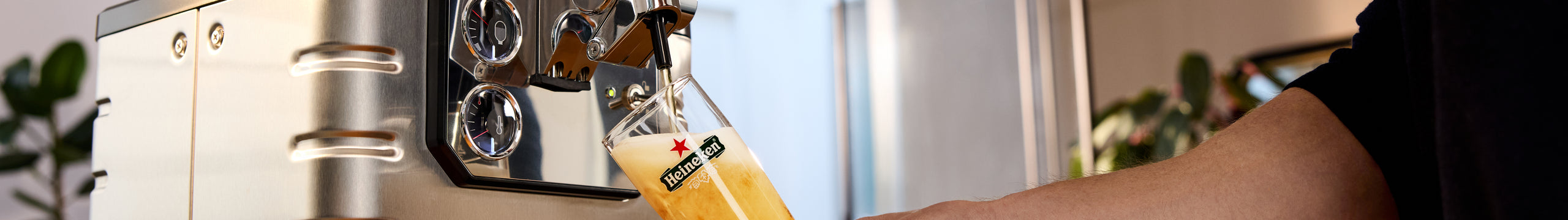 Heineken being Poured from Blade Beer Tap in Living Room. Home Bar Draft Experience.