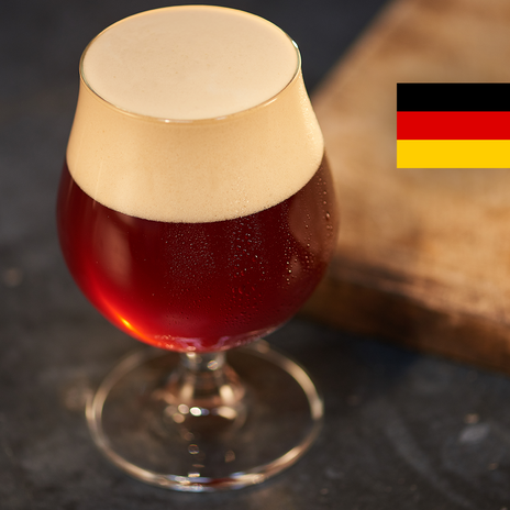 A glass of beer and a German flag