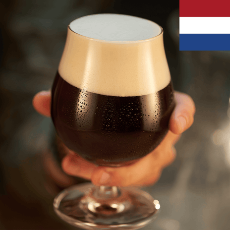 A full glass of dark beer with a flag of the Netherlands in the top right corner.