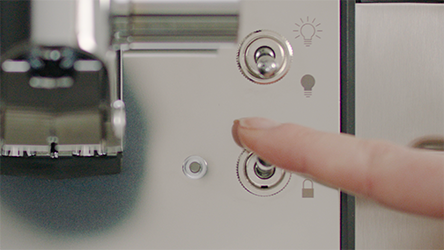 An image of flicking the switch down to lock the keg into your BLADE.