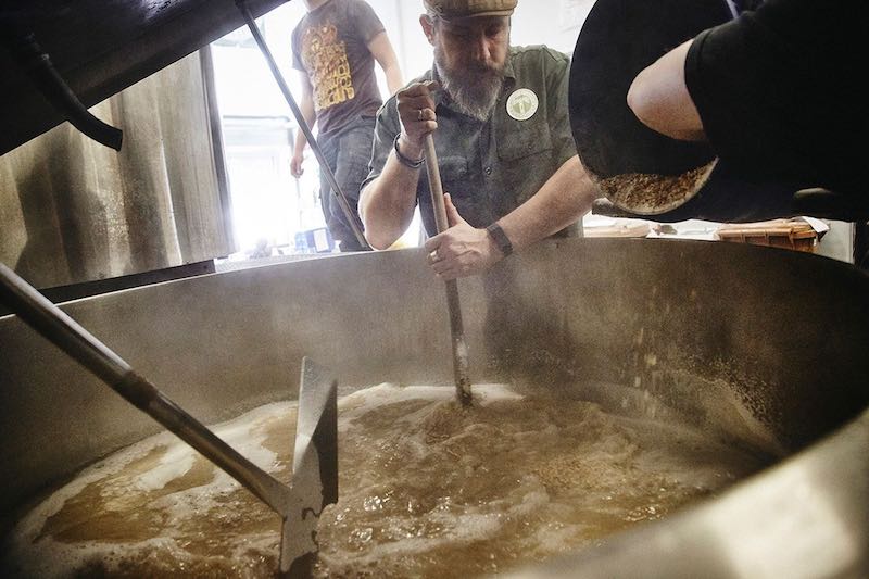 Brewing process in progress at Kehrwieder Kreativbrauerei, with brewing kettles and equipment visible.